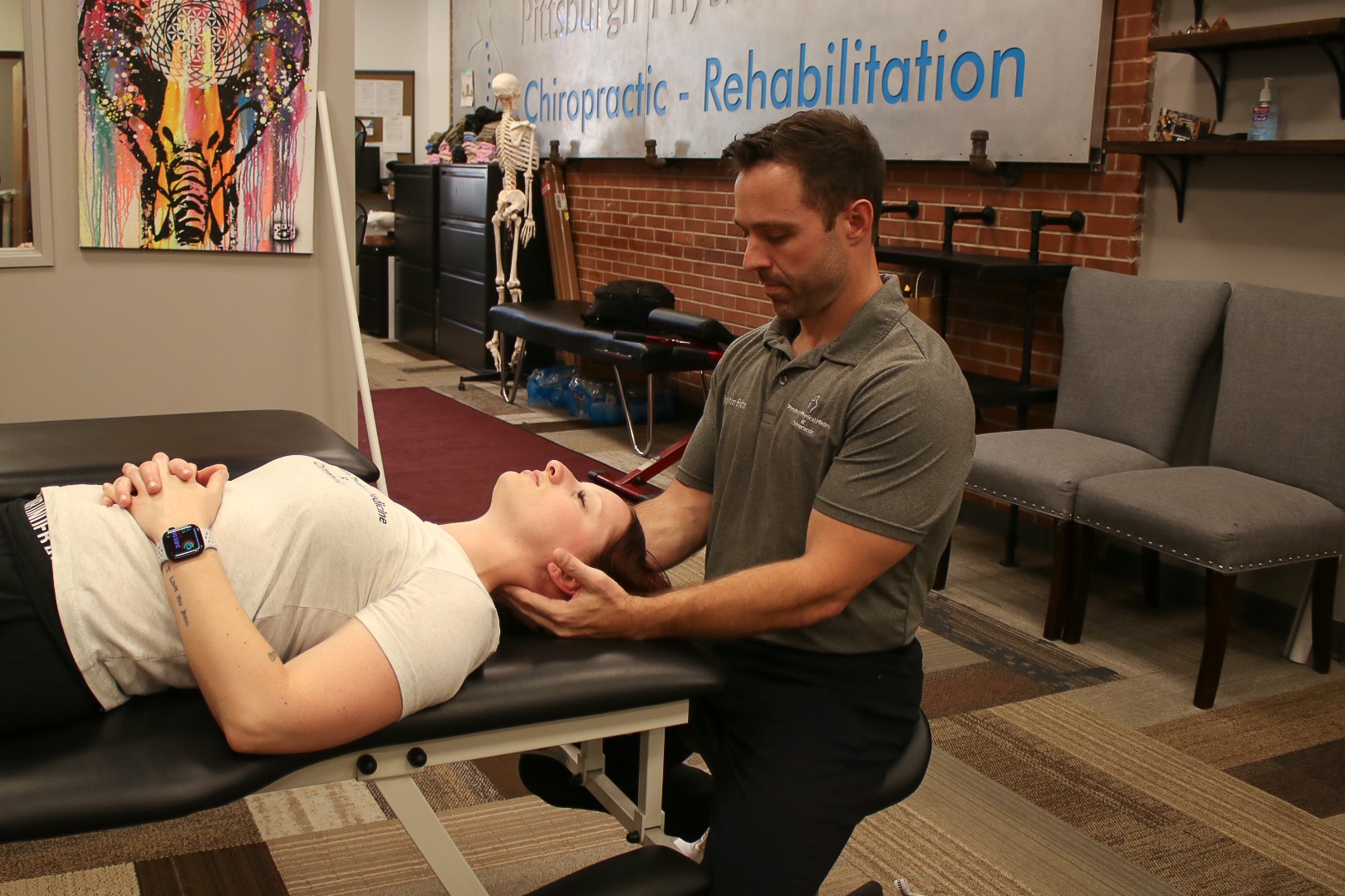 Physical therapist treating neck pain with manual therapy Pittsburgh