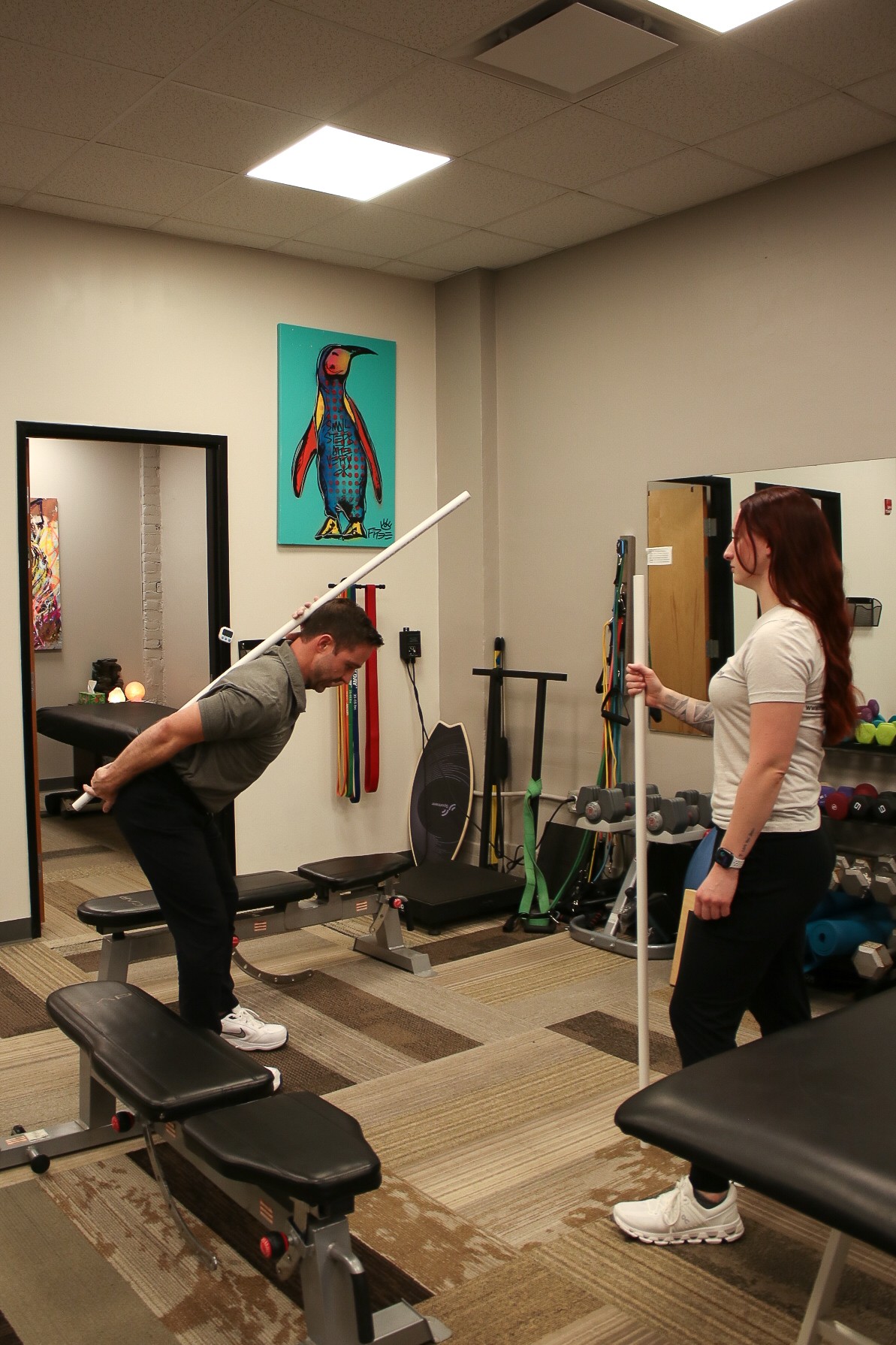 Physical therapist working with athlete on sports injury rehabilitation Pittsburgh